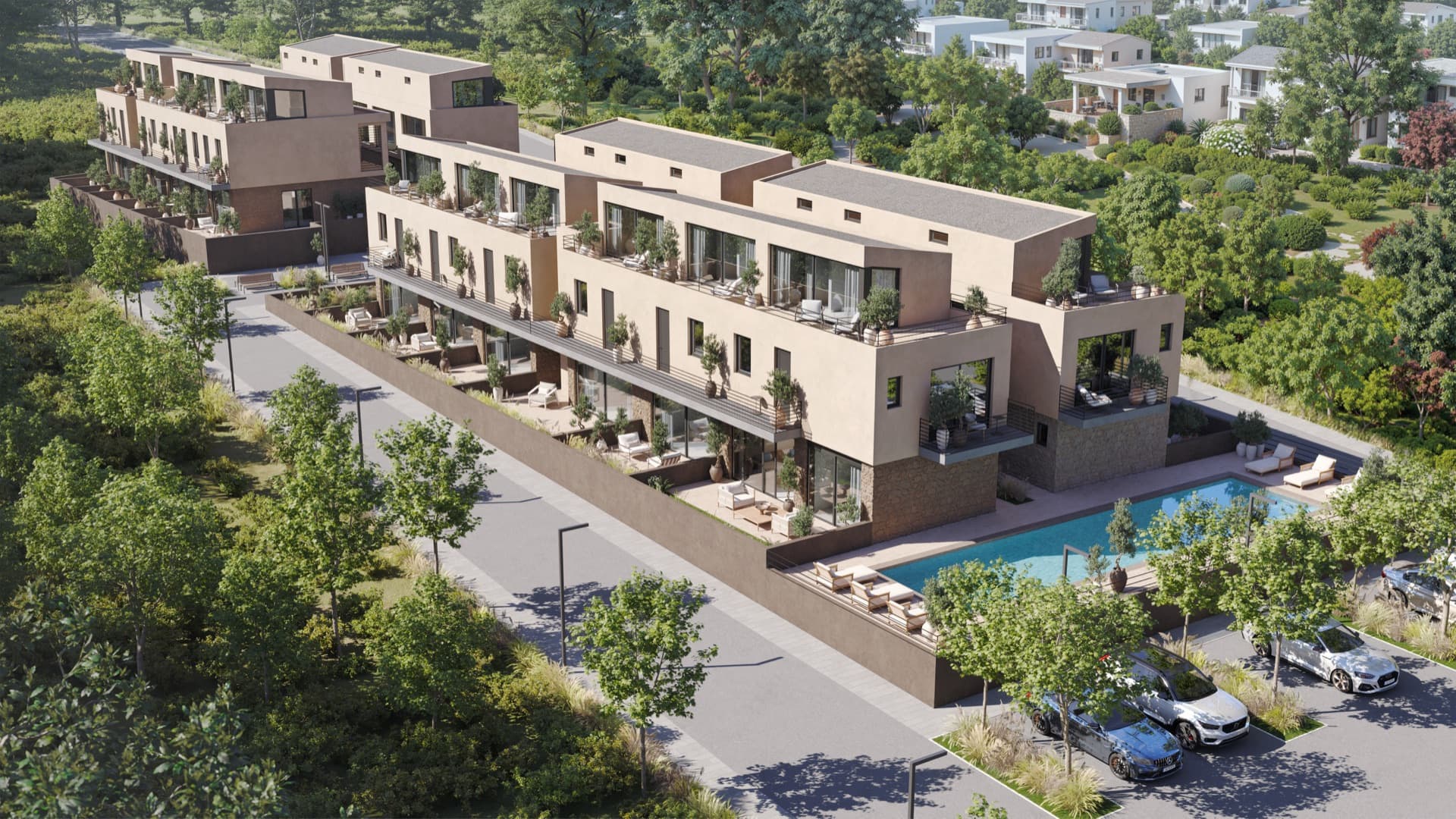 Aerial view of The River, a Cretan Coast development in Kalyves, Crete, with infinity pool and landscaped gardens